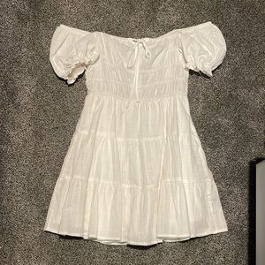 Summery white, flowing dress.